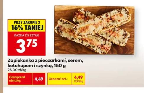 Zapiekanka z pieczarkami serem ketchupem i szynką
